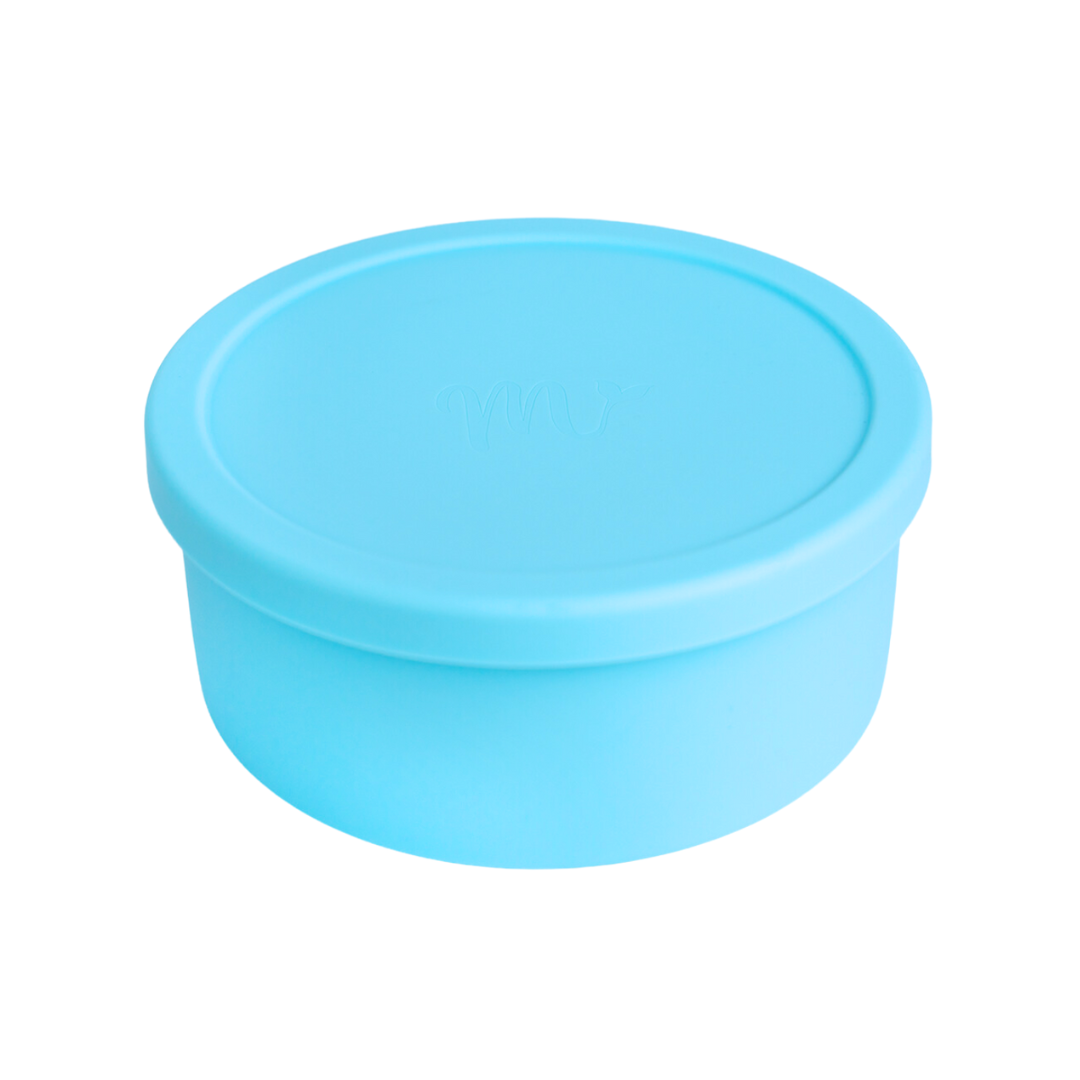 Light blue, round silicone bento bowl with Mermaid Straw logo on lid